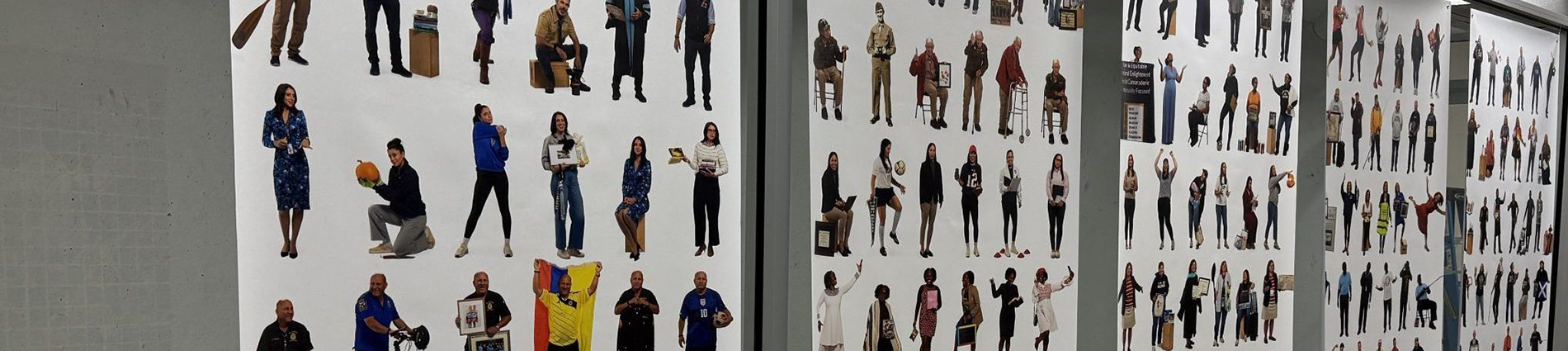 A photo wall shows many people engaged in a variety of activities.